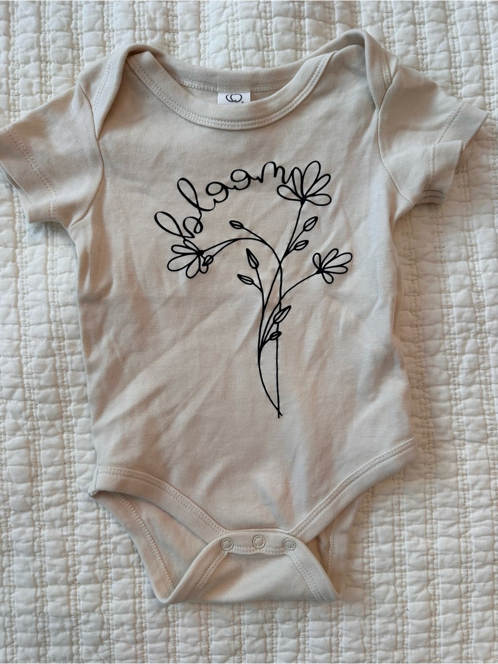 Colored Organics Neutral Cream Baby Bodysuit with Black Floral Graphic